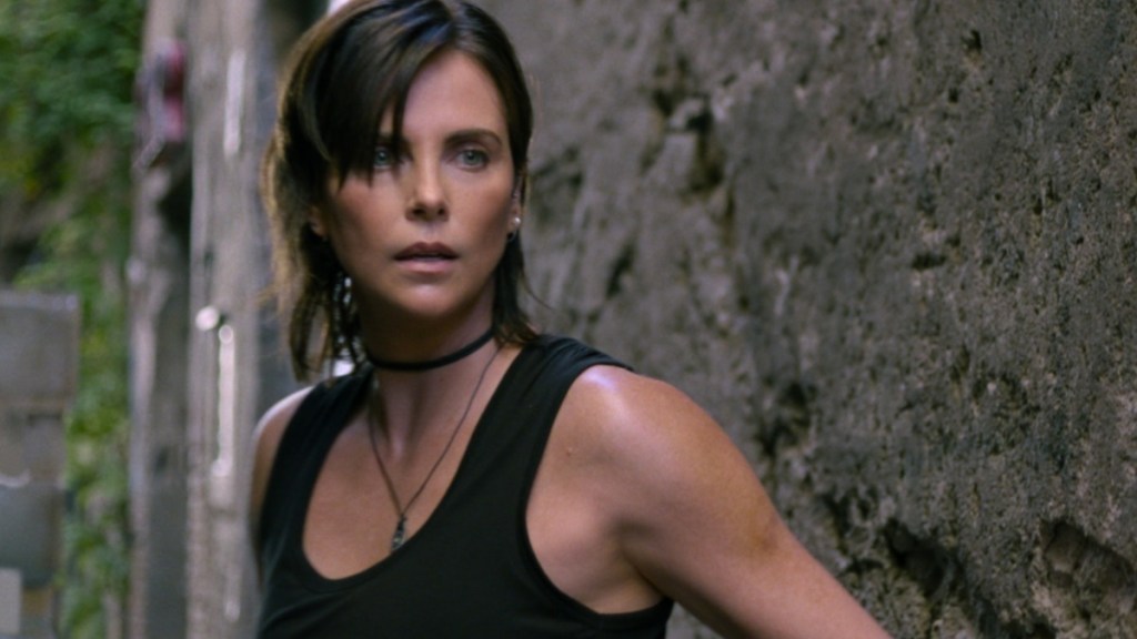 Henry Golding Compares Charlize Theron to Tom Cruise